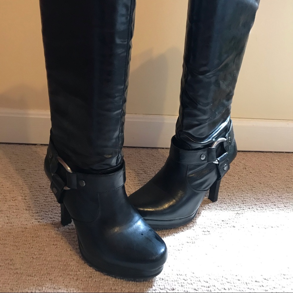 Black dressy heeled boots.